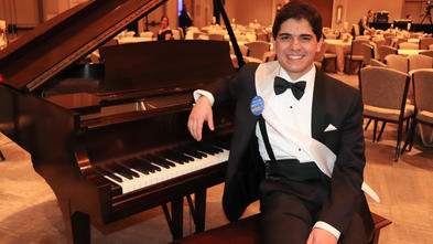 Hunter with his brand new grand piano at the 35th Anniversary Gala
